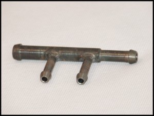 Czwórnik zbiornika wyrównawczego Karosa